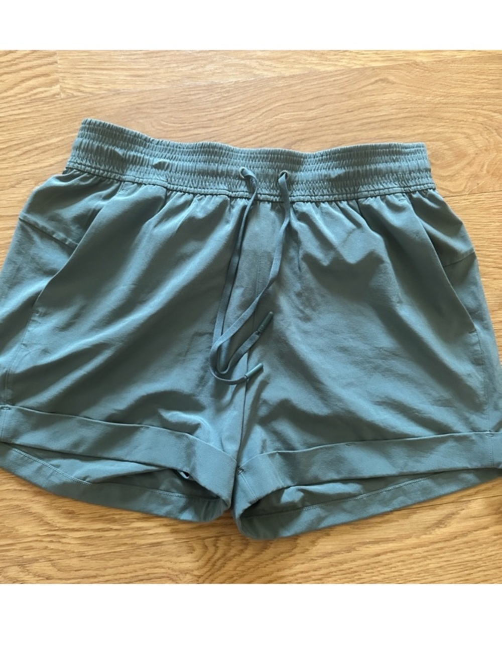 lululemon athletica Women's Athletic Drawstring Shorts Teal Blue Green pockets